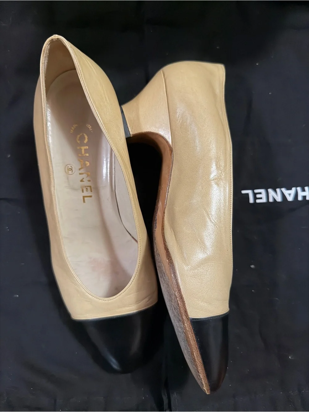 CHANEL Beige Leather Flats with Black Cap Toe